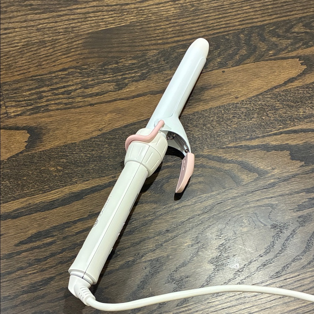 White and Pink Curling Iron
